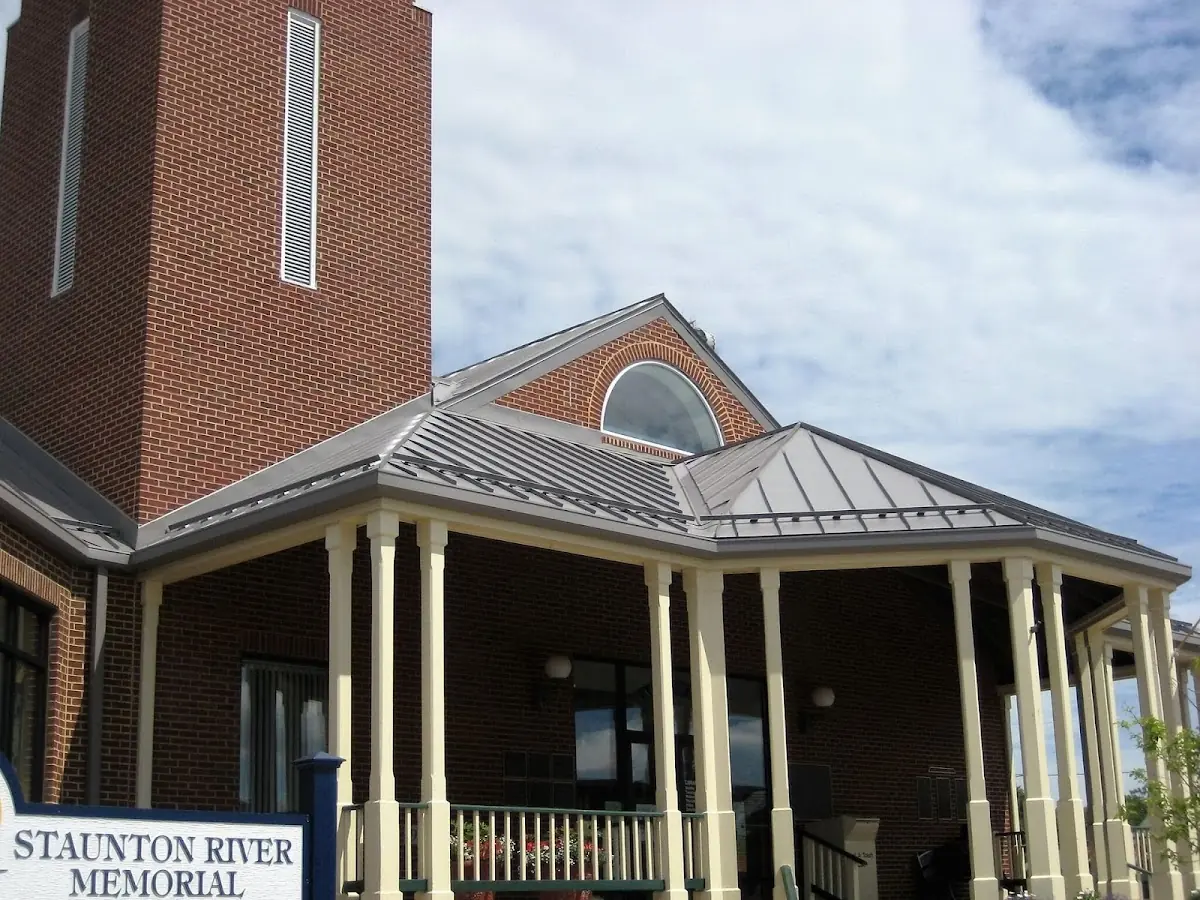 Skilled roofing craftsmen working on a residential roof in Collingswood
